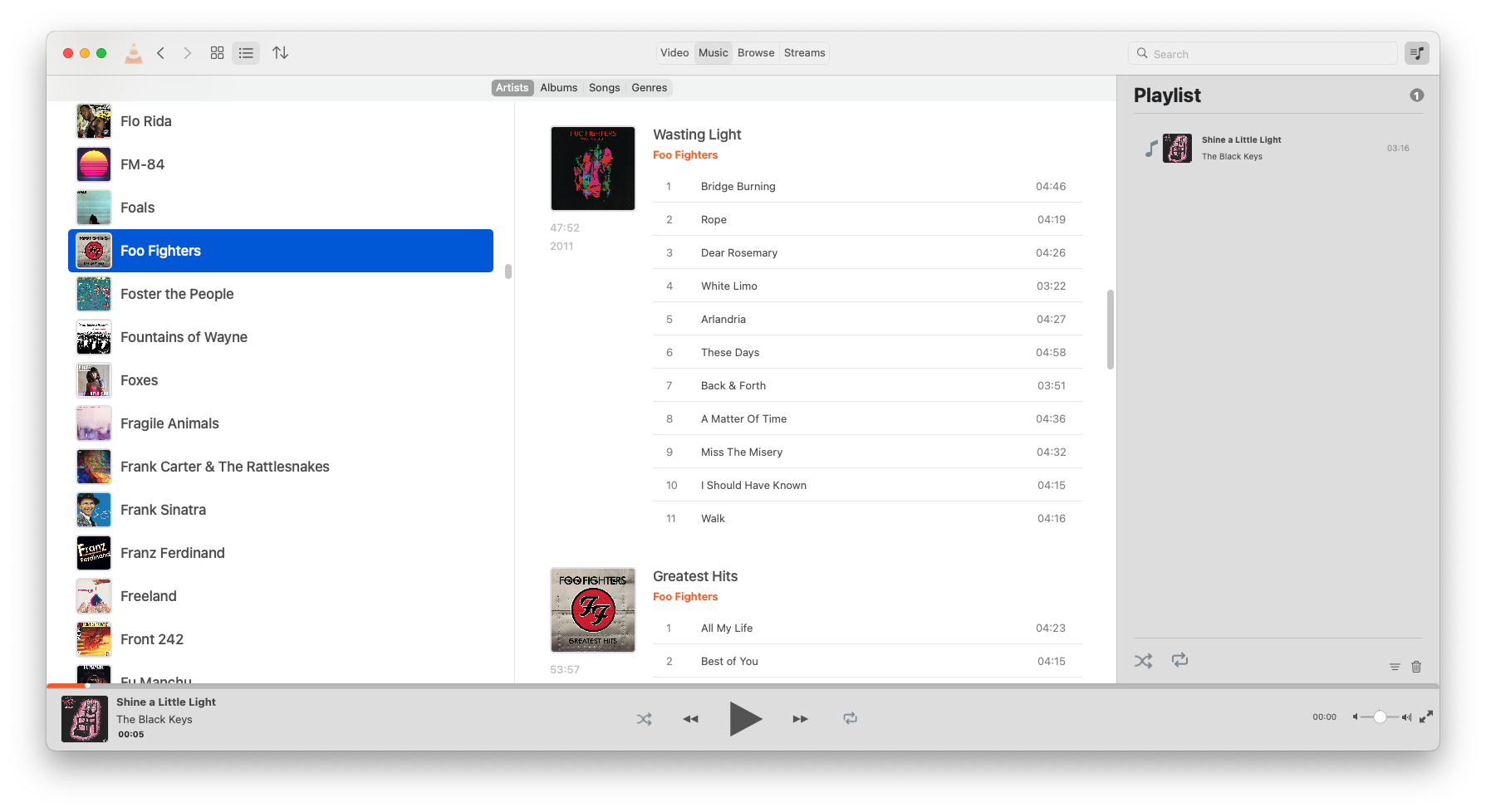 The “artists” view showing the redesigned selection view and smaller song cells